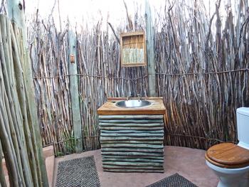 This open-air private bathroom was very pleasant until the rain started. Photo by George Anderson